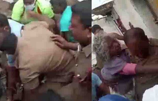 வீடு இ.டி.ந்து இ.டி.பாடுகளில் சிக்கிய மூதாட்டி : இடுப்பில் வைத்து தூக்கி ஆம்புலன்சில் அமர வைத்த வீரர்!!