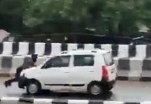 காரின் பானெட்ல் வைத்து இழுத்து செல்லப்பட்ட நபர்: வாக்குவாதத்தால் இளைஞர் செய்த செயல்!!