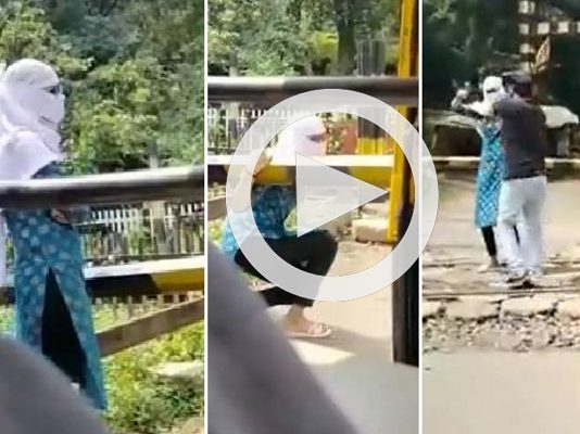 கதறி அழுதபடி ரயில் முன் நின்ற இளம்பெண் : அடுத்த சில நொடிகளில் நடந்த திகிலூட்டும் காட்சி!!